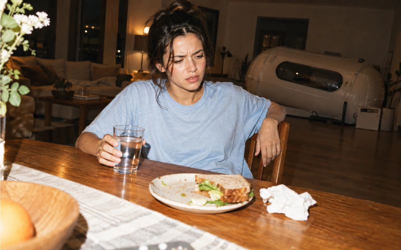 Person feeling queasy at home an hour after a chamber session